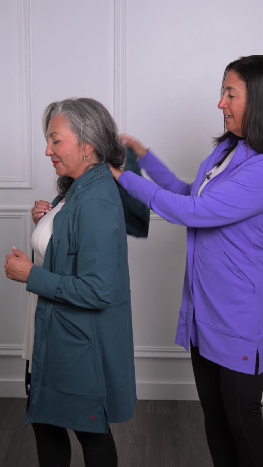 Two women wearing the Madison Long Jacket